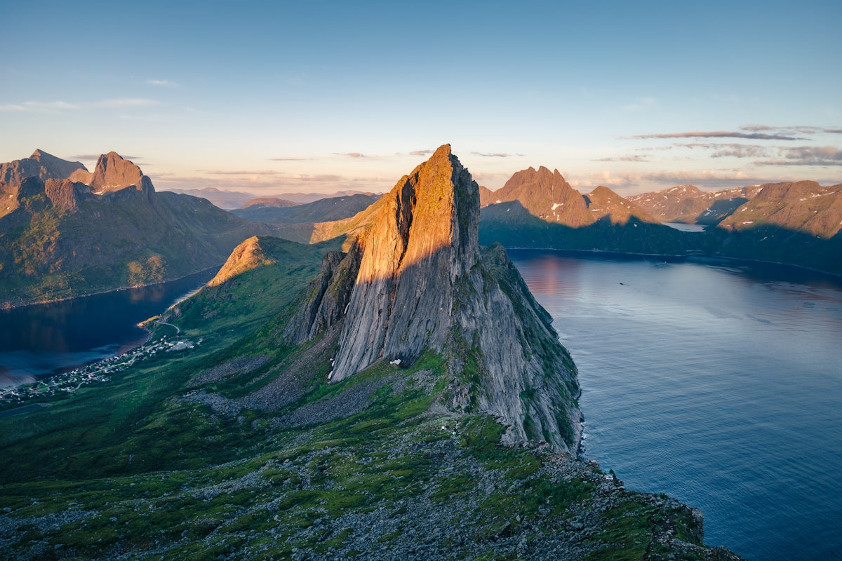 A mountain with a lake in the middle of it
